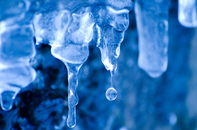 Winter scene in Pantego showing frozen icicles forming from dripping water in cold weather.